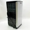 The back of a white and black portable air conditioner is shown against a white background. Voir les images du produit