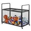 A black metal ball cart filled with various sports balls, including basketballs, soccer balls, and volleyballs, on a white background. Anteprima dell’immagine prodotto