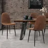 A dining room setting with a table and chairs. Náhľad obrázku produktu