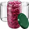 Three glass jars, one filled with red cabbage, and a green lid are arranged on a white background. Podgląd zdjęcia produktu