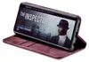 A smartphone in a burgundy flip case is displayed on a white background. The phone screen shows a movie poster titled 'The Inspector'. Produktbild-Vorschau