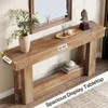 A wooden console table with decorative items and flowers, placed against a wall with a mirror above it. Produktbild-Vorschau