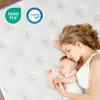 A mother and baby sleeping on a mattress. Produktbild-Vorschau