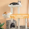 A cat tree with multiple levels and resting spots, featuring cats on different platforms. The background is a plain wall with some decorative molding. Podgląd zdjęcia produktu