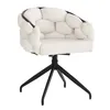 A white accent chair with a black base. Produktbild-Vorschau