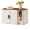 A cat is sitting inside a modern cat litter box enclosure with double doors. Produktbild-Vorschau