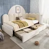 A child's bedroom with a beige upholstered bed featuring storage drawers. The bed is made up with a quilted blanket and pillows. The room has blue padded wall panels and a patterned wallpaper. Anteprima dell’immagine prodotto