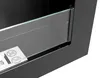 A close-up view of a black ethanol fireplace with a glass barrier and safety warning stickers. Voir les images du produit