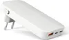 A white power adapter with two USB-C ports and one USB-A port, shown at an angle on a white background. Podgląd zdjęcia produktu