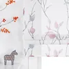 A close-up view of a window blind with a floral pattern, next to a decorative horse figurine and branches with orange berries. Produktbild-Vorschau