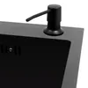 A close-up view of a black soap dispenser mounted on the edge of a black sink. Podgląd zdjęcia produktu