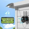 A solar-powered security camera with a solar panel mounted on a house exterior, showing its pan and tilt capabilities and a smartphone screen displaying a live feed. Náhled obrázku produktu