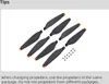 A set of drone propellers and screws are laid out on a white background with instructional text below. Náhľad obrázku produktu