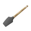 A single kitchen spatula with a gray silicone head and a wooden handle, isolated on a white background. Anteprima dell’immagine prodotto