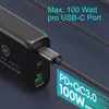 A close-up shot of a black USB-C charger plugged into a cable, with marketing text overlayed. Produktbild-Vorschau