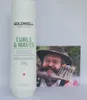 A bottle of Goldwell Dualsenses Curls & Waves Hydrating Shampoo is placed next to a postcard featuring a man with a large beard and a hat. Anteprima dell’immagine prodotto