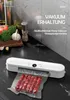 A white vacuum sealing machine on a black marble countertop, with a package of sausages being sealed. Produktbild-Vorschau
