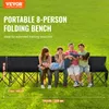 A group of young people are sitting and lounging on a portable folding bench outdoors on a grassy field. Anteprima dell’immagine prodotto