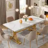 A dining room scene with a marble-top dining table and chairs. Voir les images du produit