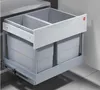 A pull-out kitchen waste bin system with two compartments, installed in a cabinet. Produktbild-Vorschau