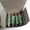 Four batteries in a clear plastic holder inside a cardboard box. Náhled obrázku produktu