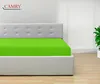 A bed with a green fitted sheet and a tufted headboard in a room. Produktbild-Vorschau