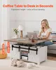 A woman is working on a laptop at a lift-top coffee table that has been raised to desk height. Voir les images du produit