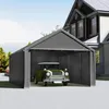 A gray carport tent with a green classic car inside, in front of a house. Produktbild-Vorschau