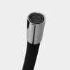Close-up of a faucet head with a black hose. Produktbild-Vorschau