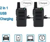 Two walkie-talkies are shown, one indicating it is charging and the other indicating it is charged. Below are icons representing different charging sources. Produktbild-Vorschau
