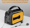 A yellow and black portable radio with a handle and solar panel on top, shown with headphones. Náhled obrázku produktu