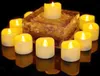 A group of LED tea lights arranged around a decorative block. Produktbild-Vorschau