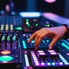 A hand operating a DJ mixing board with colorful lights. Anteprima dell’immagine prodotto