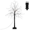 A black LED tree with warm white lights and a black base, shown against a white background. A black power adapter is shown to the right. Náhled obrázku produktu