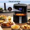 A black air fryer is shown on a table with food, with a window in the background. Text overlays highlight features. Produktbild-Vorschau