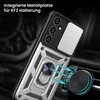 A close-up of a phone case with a ring holder, attached to a car vent mount. Produktbild-Vorschau