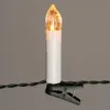 A close-up of a single white LED candle light with a flame-shaped light bulb, attached to a green string of lights with a black clip. Náhled obrázku produktu