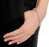 A close-up shot of a woman's hand wearing a diamond bracelet. Náhľad obrázku produktu