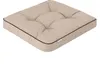 A single beige cushion with brown piping, shown from a slightly elevated angle against a white background. Náhled obrázku produktu