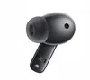 A close-up studio shot of a single black wireless earbud. Podgląd zdjęcia produktu