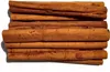 A pile of cinnamon sticks on a white background. Podgląd zdjęcia produktu