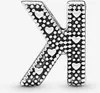 A silver charm in the shape of the letter K, decorated with small hearts and dots. Anteprima dell’immagine prodotto