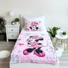 A child's bed with Minnie Mouse themed bedding. Podgląd zdjęcia produktu