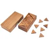 A wooden puzzle box with triangular pieces scattered around it. Podgląd zdjęcia produktu