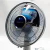 A close-up, slightly angled view of a silver and white Rowenta desk fan with a prominent blue and white label on its grille. Anteprima dell’immagine prodotto