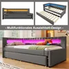 A collage showing a grey upholstered daybed with LED lighting and an under-bed. The bottom image shows the assembled bed with pillows and a tablet. Podgląd zdjęcia produktu