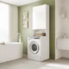 A modern bathroom with a washing machine cabinet, bathtub, and sink. Produktbild-Vorschau