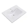 A white ceramic sink basin with a faucet hole and a drain hole, isolated on a white background. Podgląd zdjęcia produktu