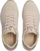 A top-down view of a pair of beige Skechers sneakers. Anteprima dell’immagine prodotto