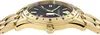 Close-up side view of a gold-colored watch with a black dial. Náhled obrázku produktu